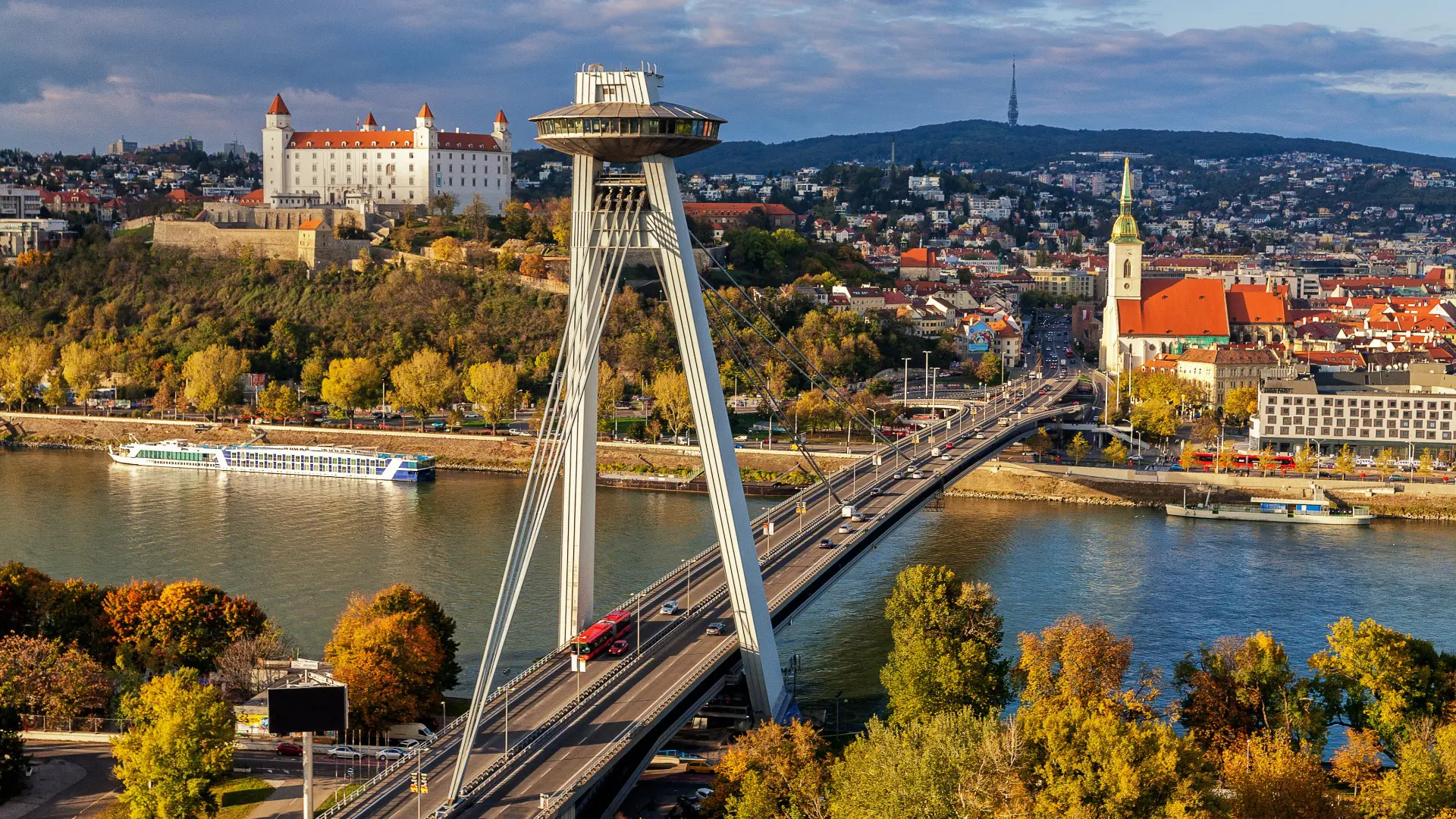 A panoramic view of Bratislava where traditional and modern buildings blend.