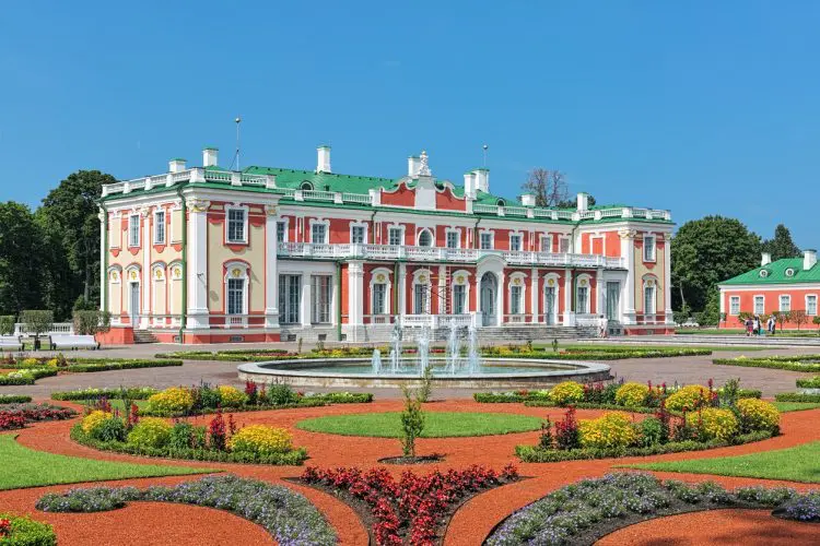 Tallinn, Estonia - July 27, 2016: Kadriorg Palace and flower garden with fountain. Kadriorg Palace is a Petrine Baroque palace built for Catherine I of Russia by Peter the Great in 1718-1727. The palace currently houses the Kadriorg Art Museum, a branch of the Art Museum of Estonia.