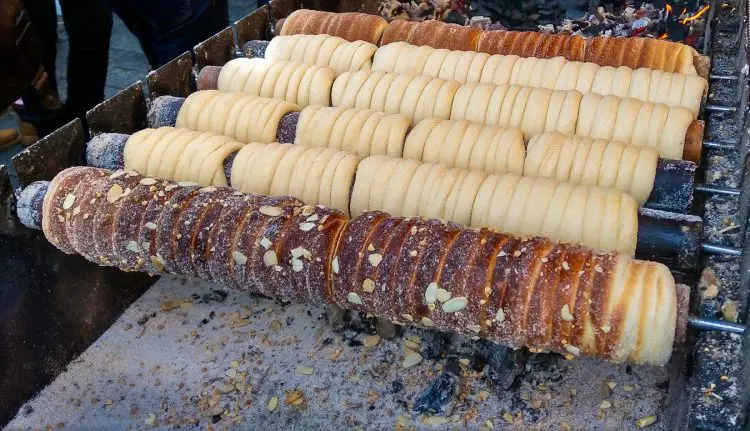 Close up of traditional Czech sweet treat Trdelnik. Trdlo bakery on the street market in Prague, Bohemia