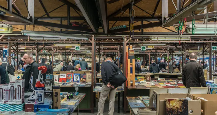 Krakow, Poland - September 21, 2018: Polish looking for Cheap Books at Krakow's Unitarg plac targowy flea market.