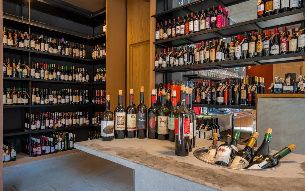 A selection of wines on a counter at 8000 vintages