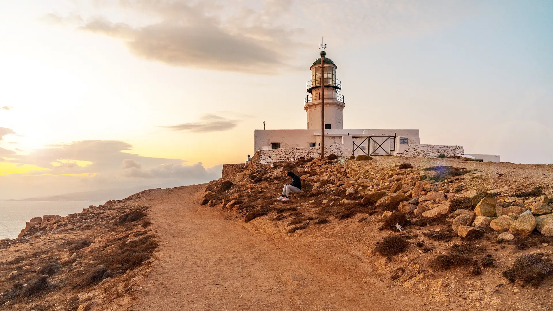 This image shows Armenistis Lighthouse and the dirt path that leads to it.