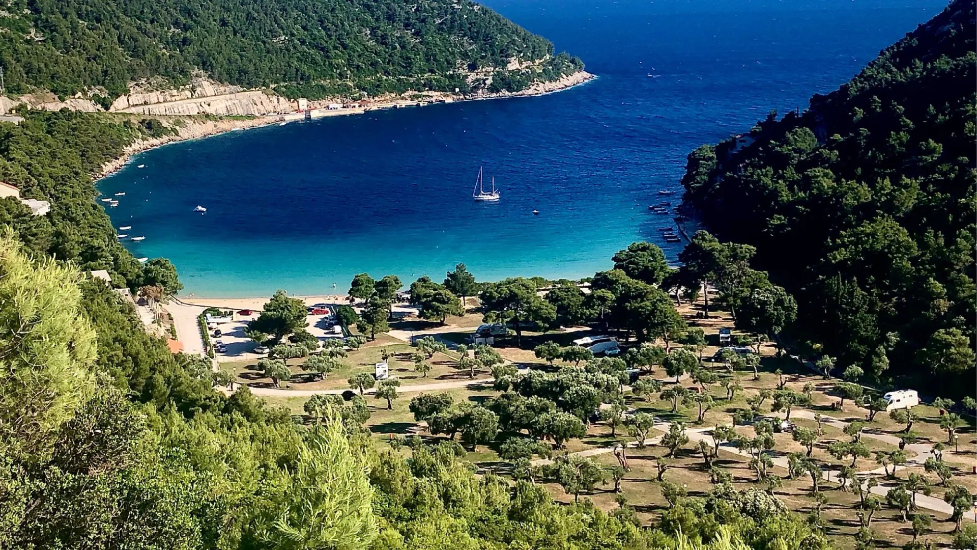 This is a panoramic view of Prapratno Bay, one of the best Croatia beaches. The sea water is turquoise near the beach but becomes deep blue the farther off the shore you go.