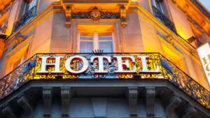 This is a close-up of a big hotel sign on a Parisian building facade.