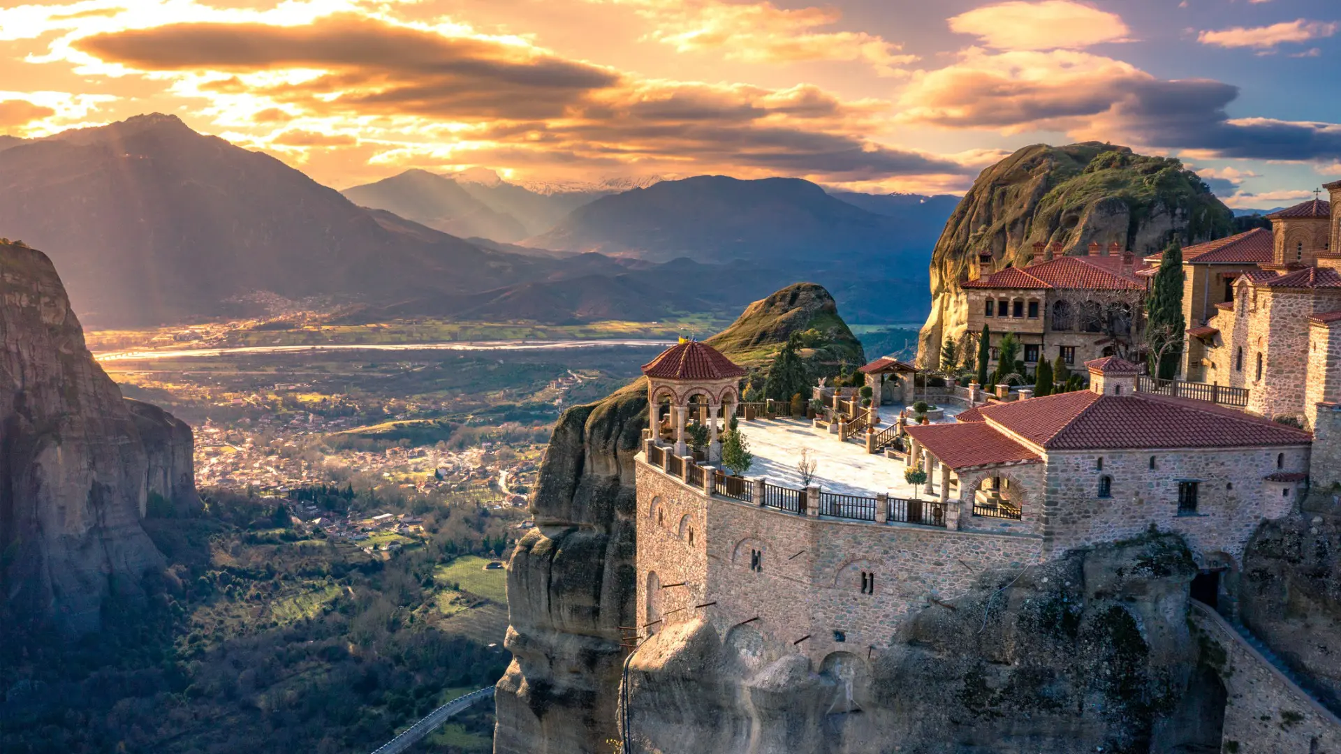 This is a photo of one of the monasteries built atop tall rocks in Meteora.