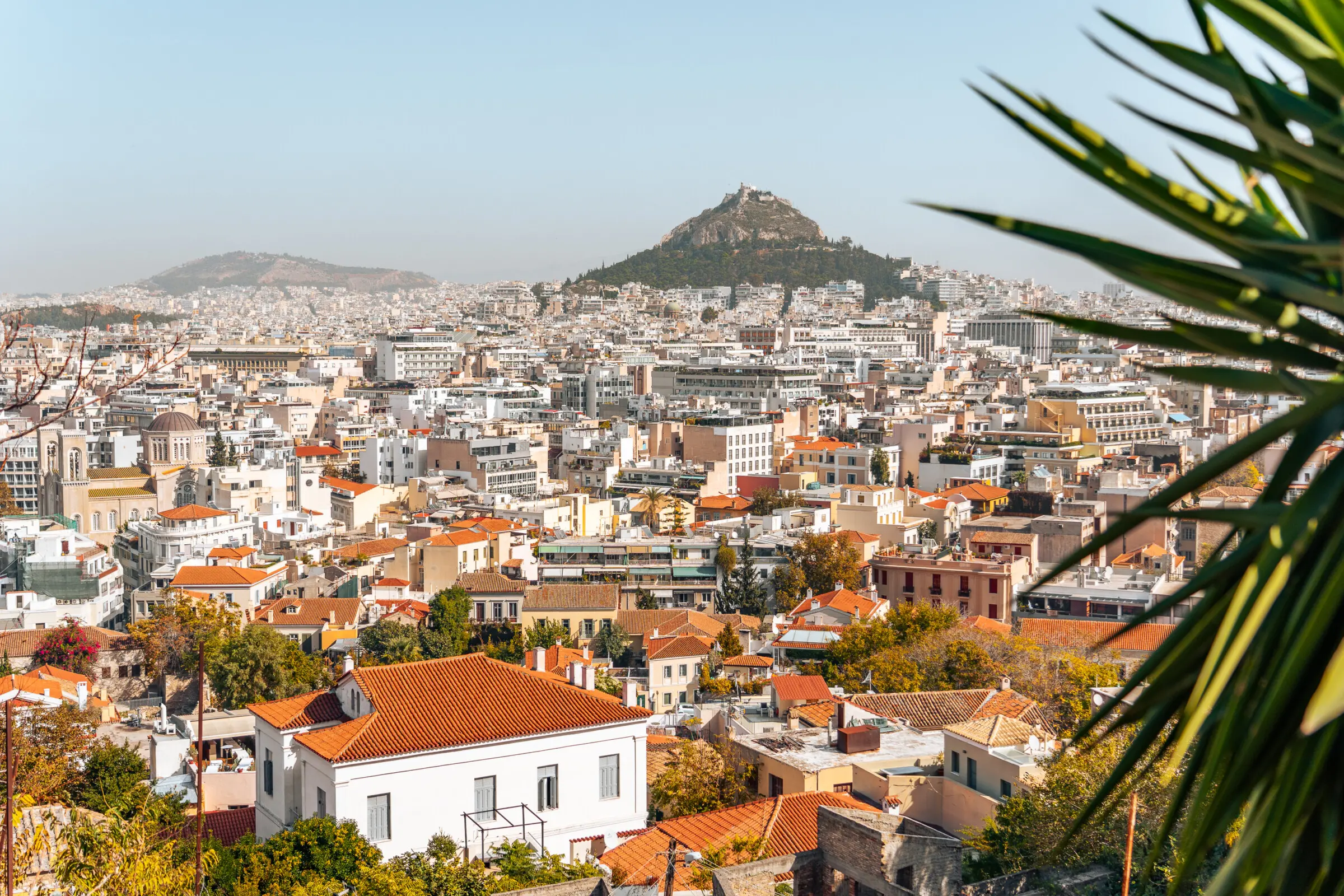 This is a panoramic view of Athens with Lycabettus Hill in the background.