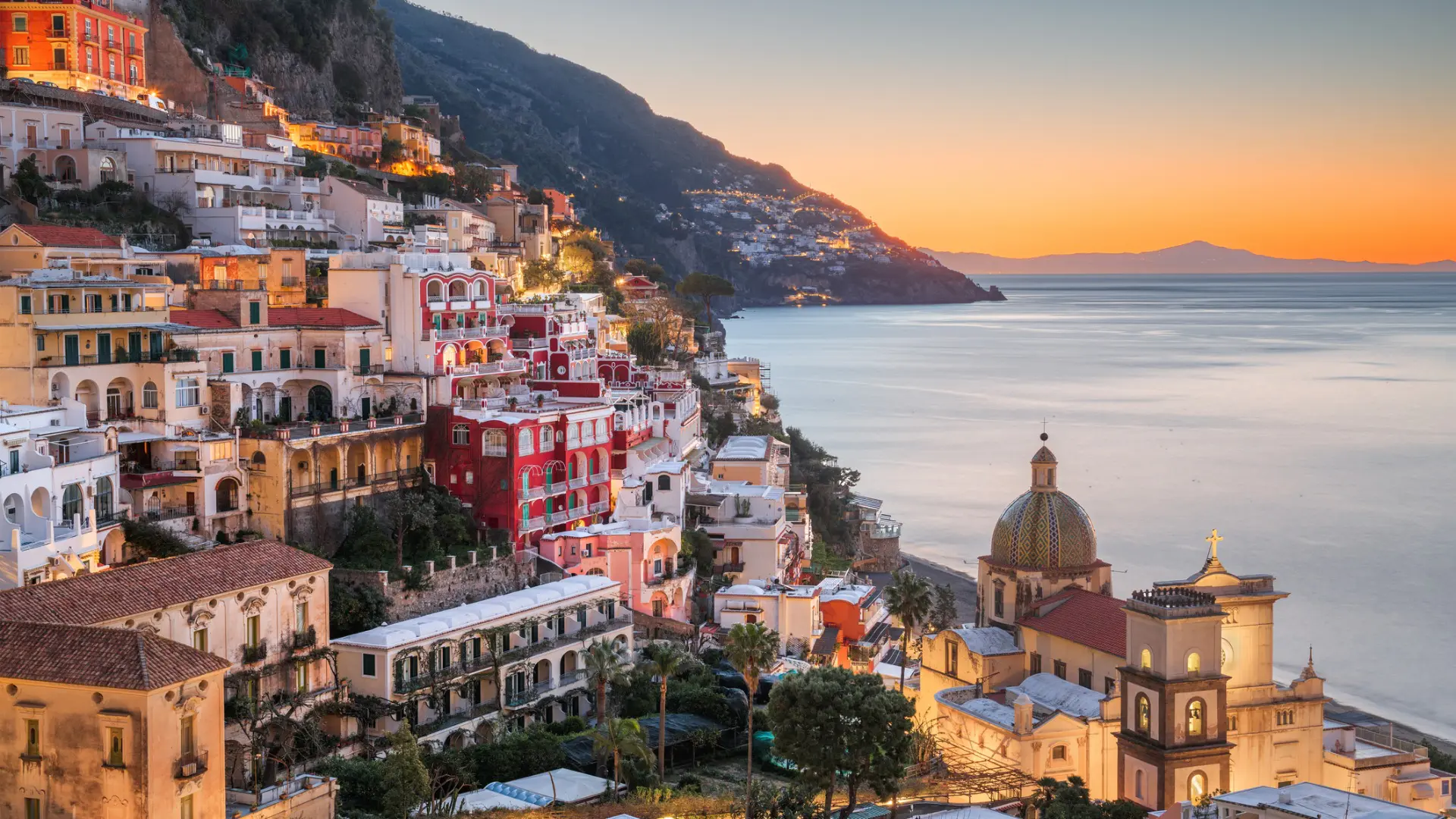 This is a panoramic view of Positano at sunset.