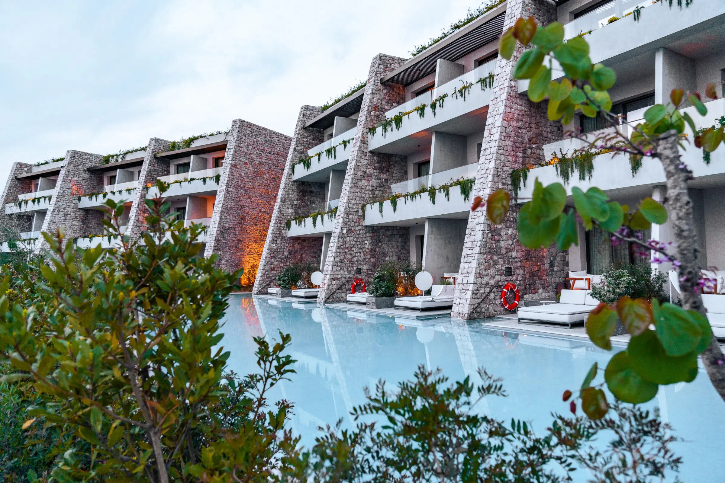 This image shows the pool area of Costa Navarino hotel.