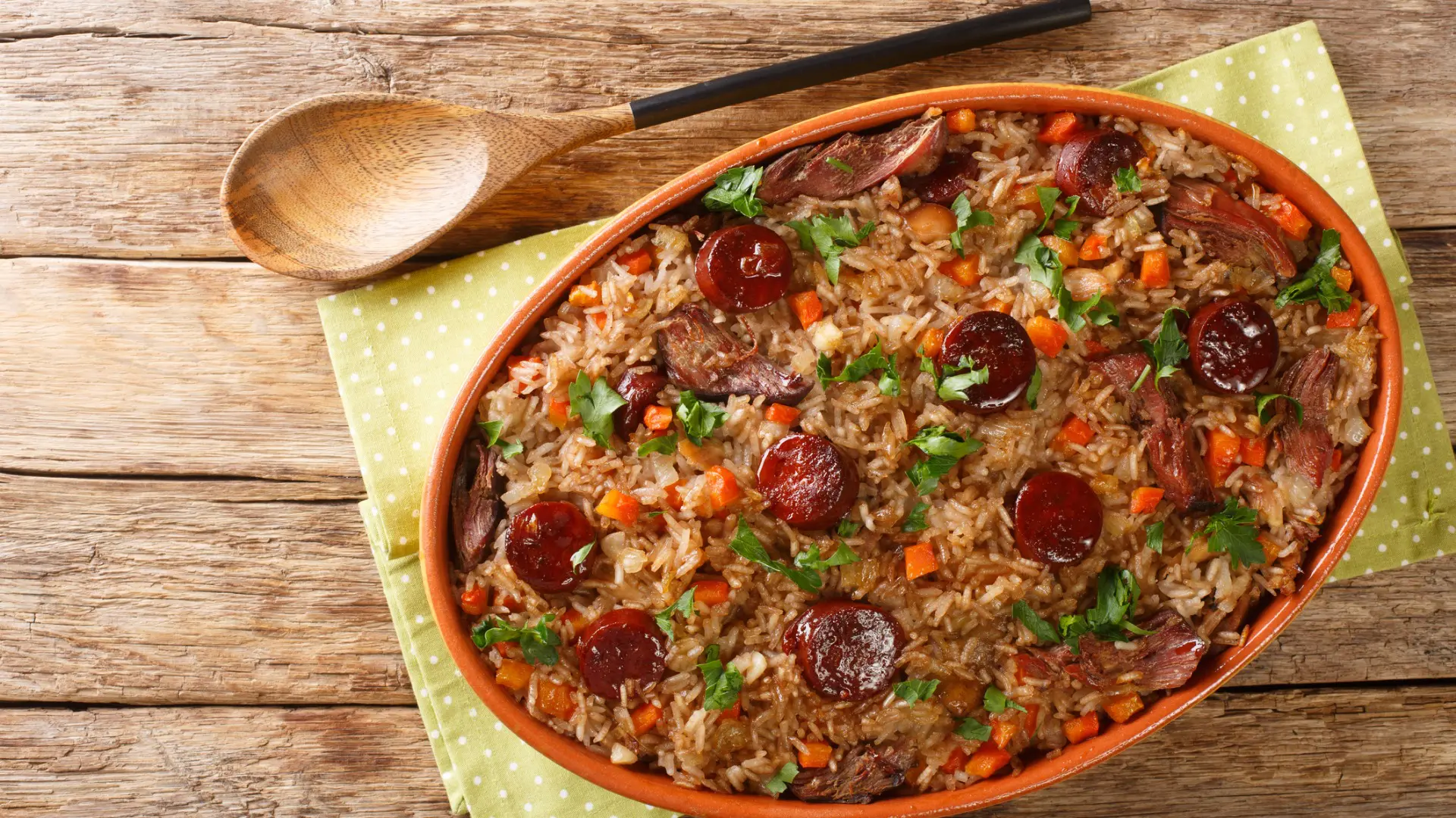 A top down image of a pot filled with Arroz de Pato.
