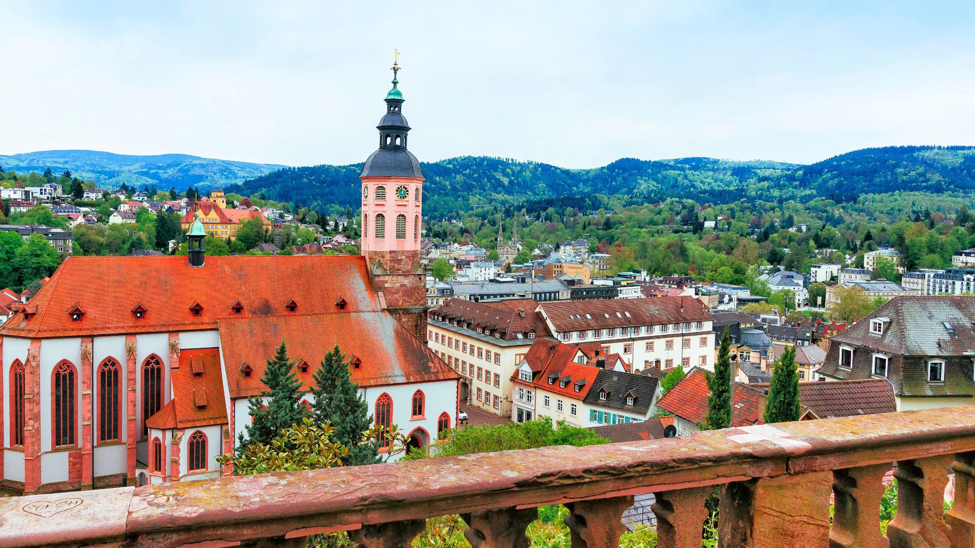 A panoramic view of Baden Baden with a big church in the foreground.