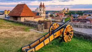An old cannon overlooking the historic center of Eger in Hungary.