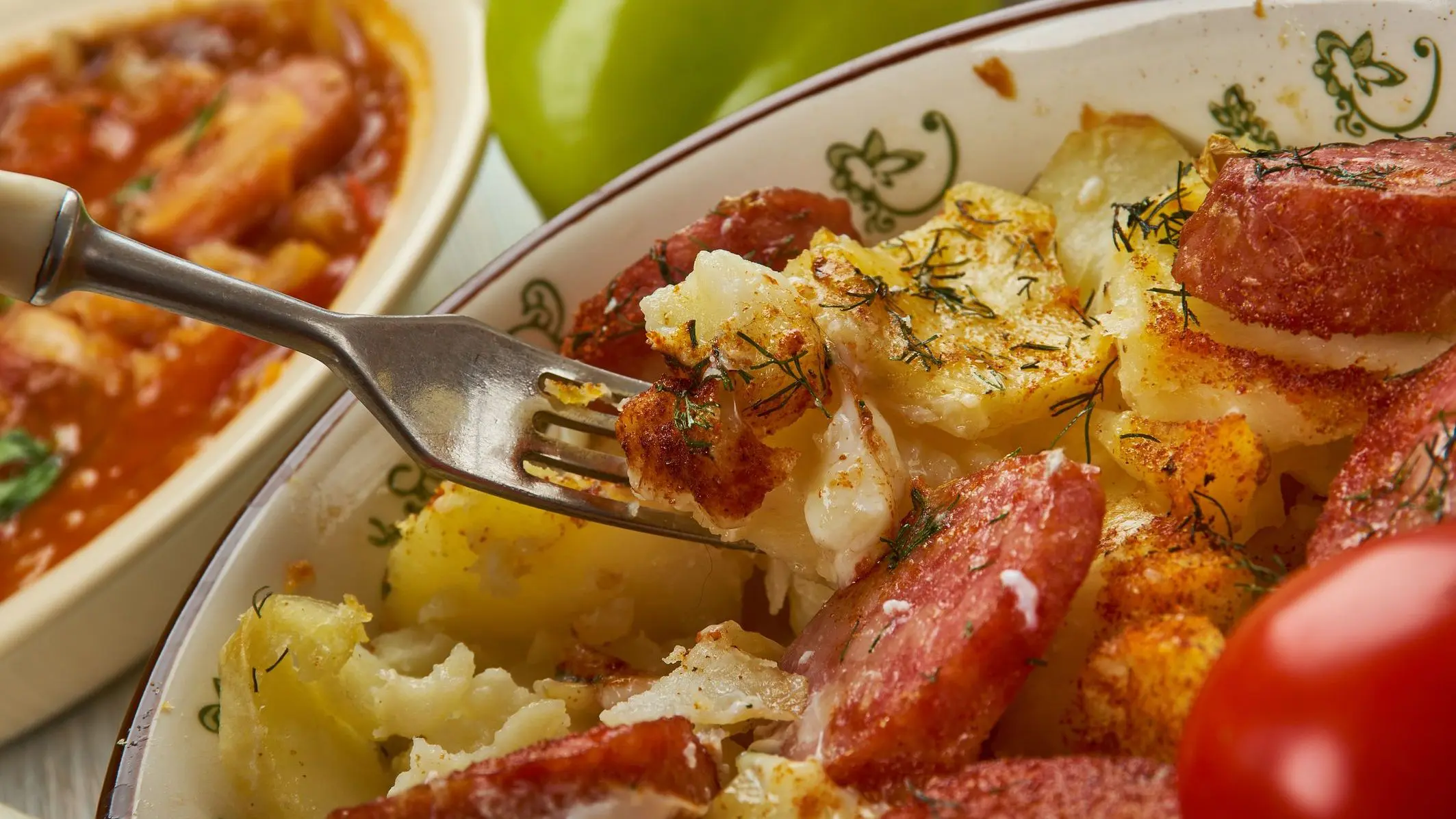 A casserole made of potatoes and sausages. 