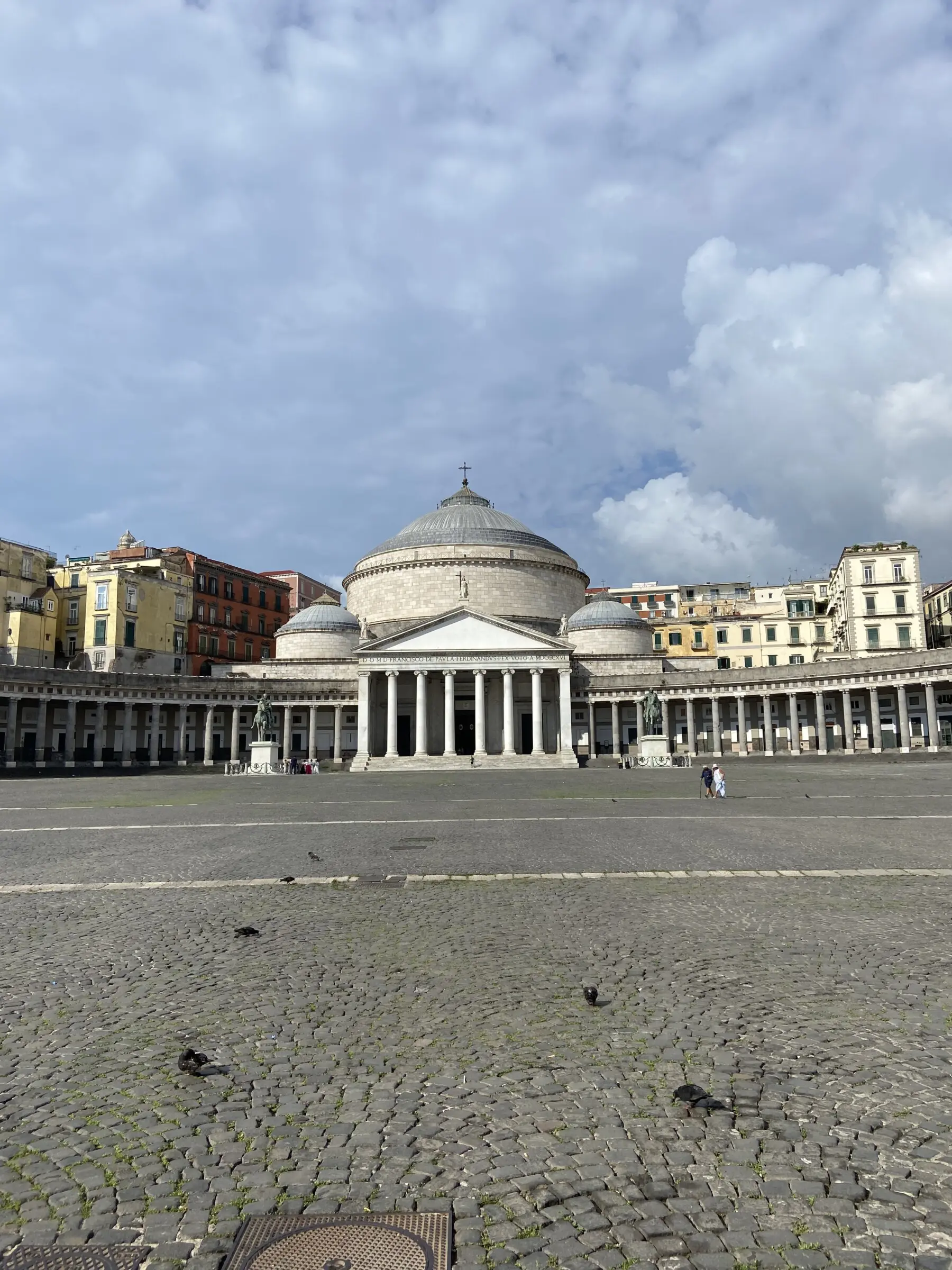 A square with a long colonnade.