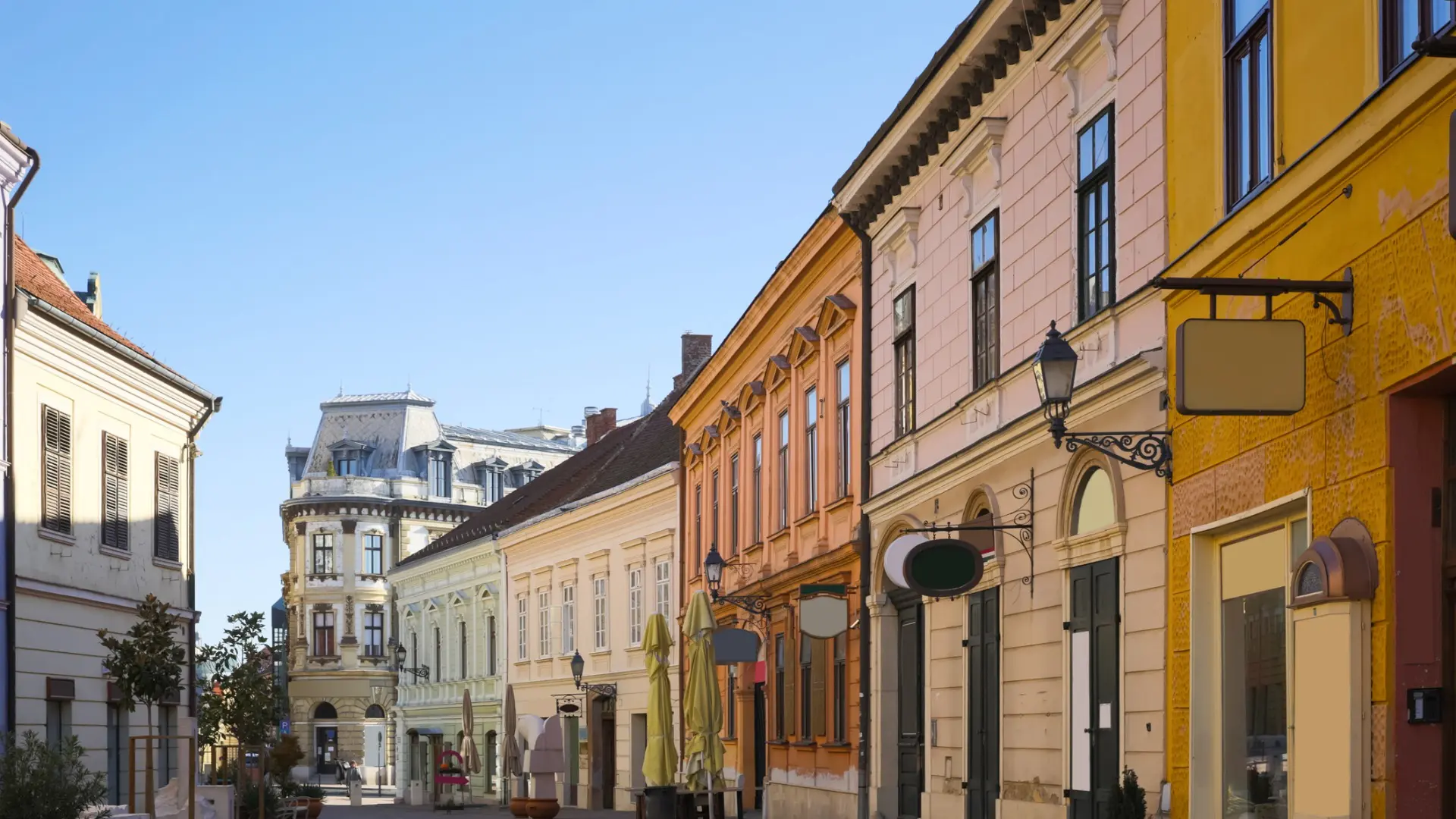 A row of pastel-colored buildings.