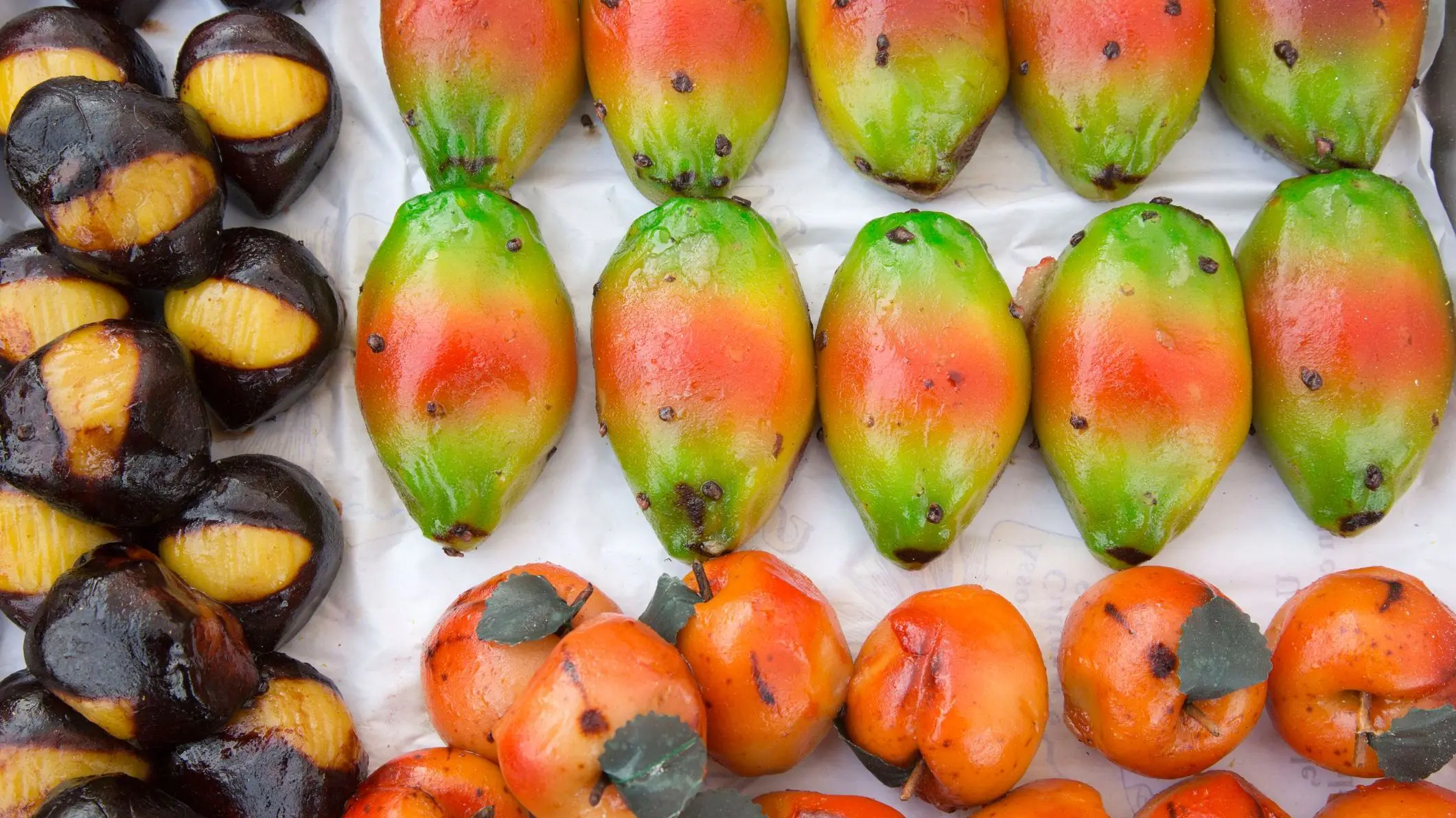 Typical Sicilian sweets made with marzipan (almond paste). This paste is modelled and painted to resemble almost every kind of fruit, vegetables and food in general.