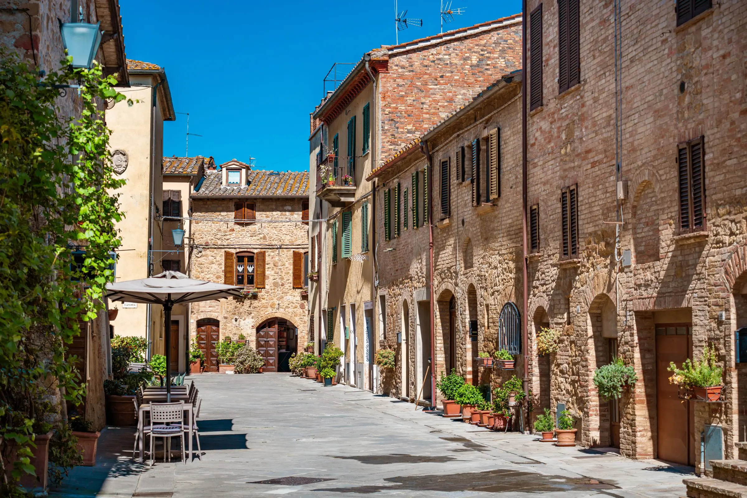 A quaint street in Pienza, one of the must-see places in Tuscany.