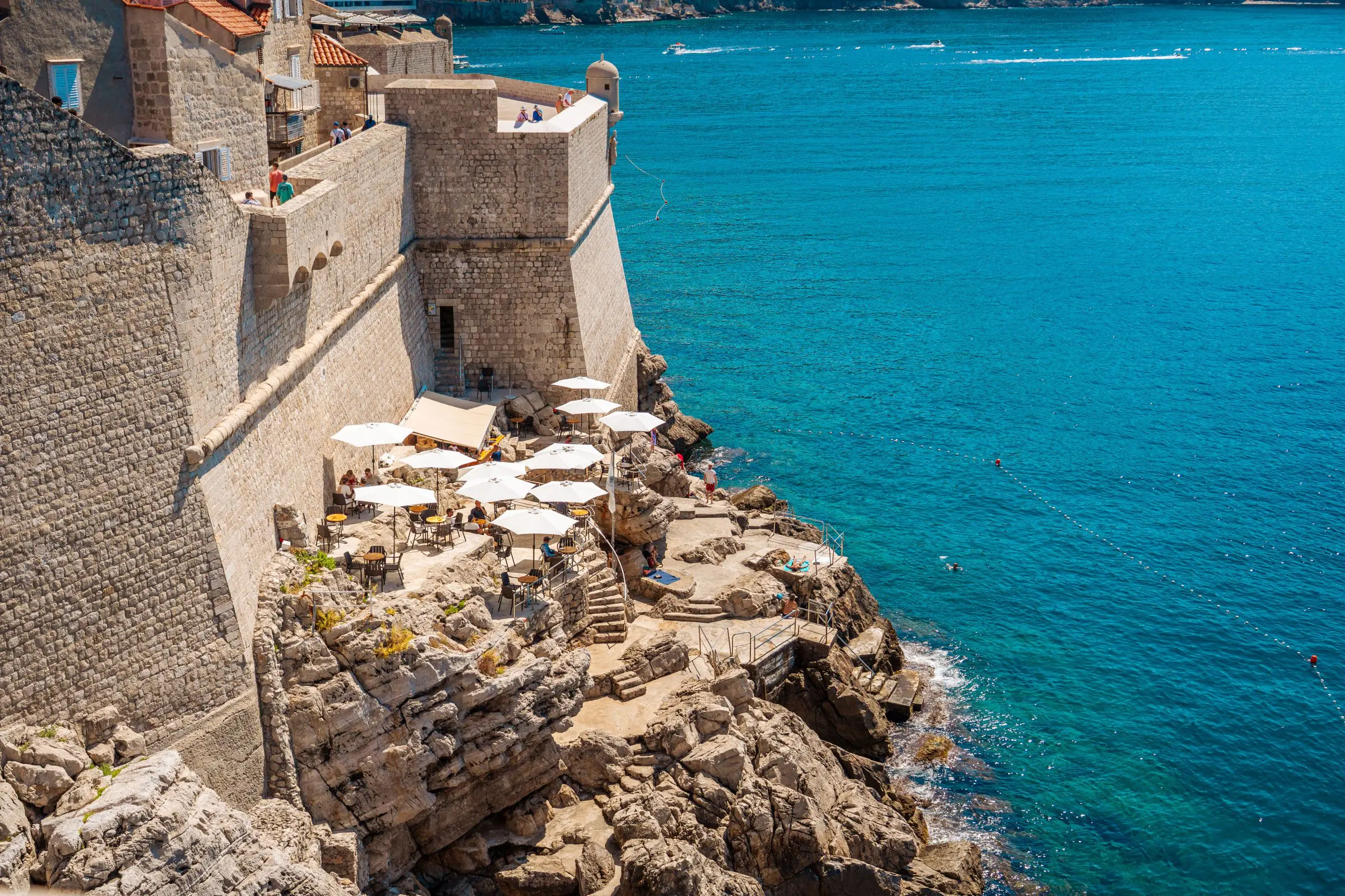 A café by the sea, perched on a rock on the old city walls.