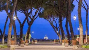 A panoramic view of Giardino degli Aranci in the blue hour.