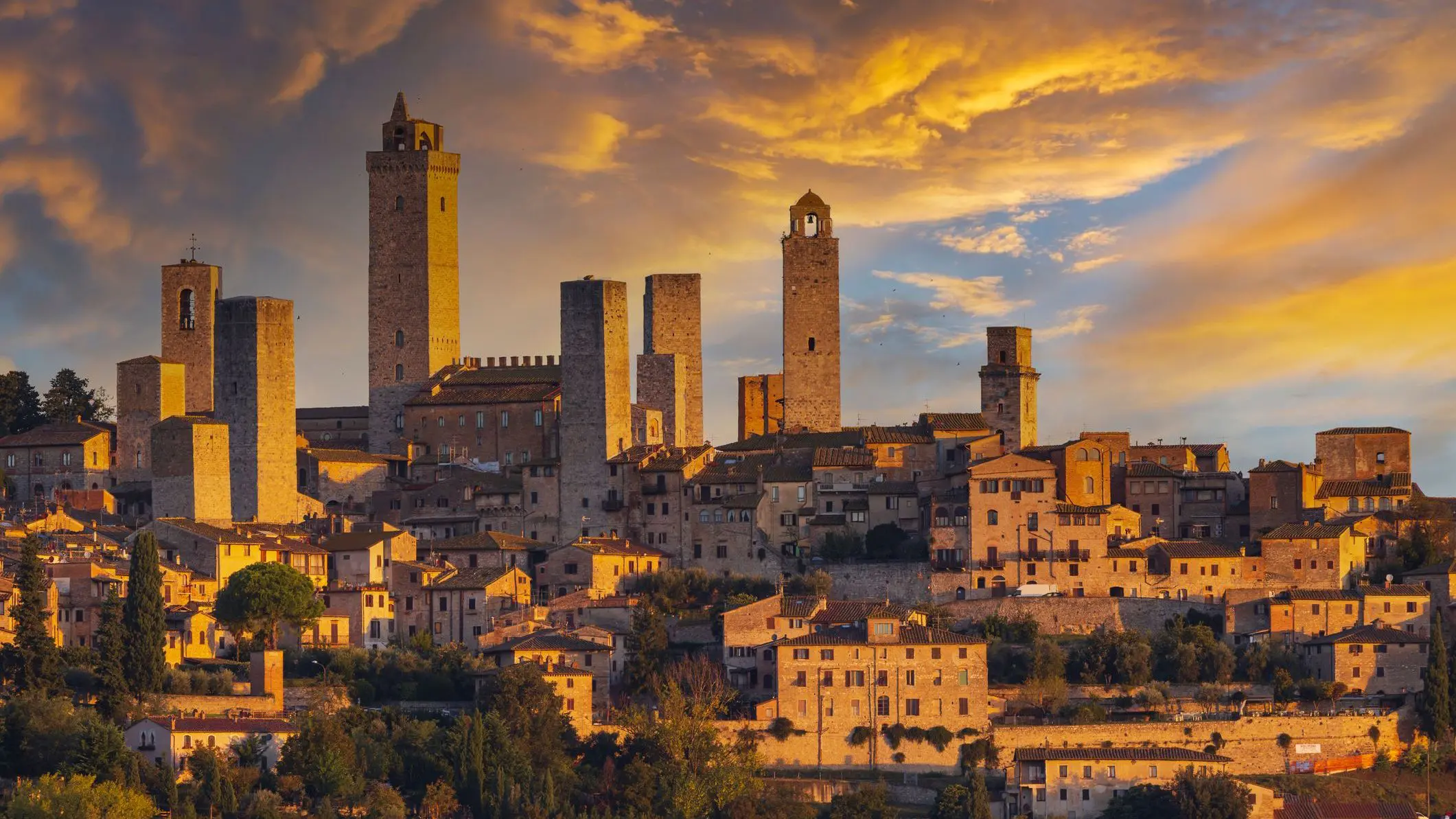 Sunset over the medieval town of San Gimignano with its tall Manhattan-like towers. 