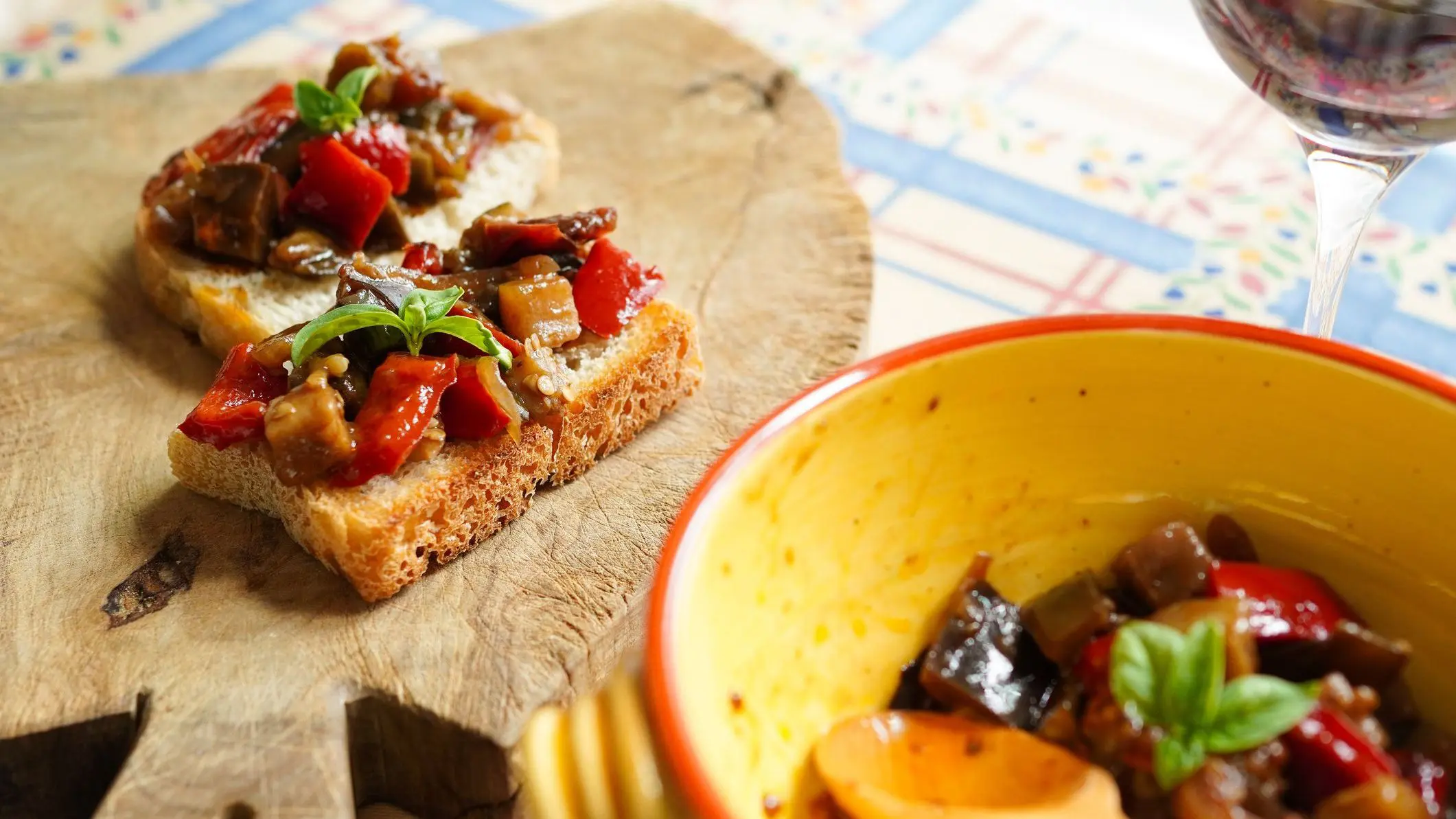 Bruschetta with Sicilian caponata made with Italian eggplant and red peppers.