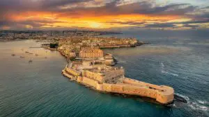 An aerial view of Siracusa at sunset.