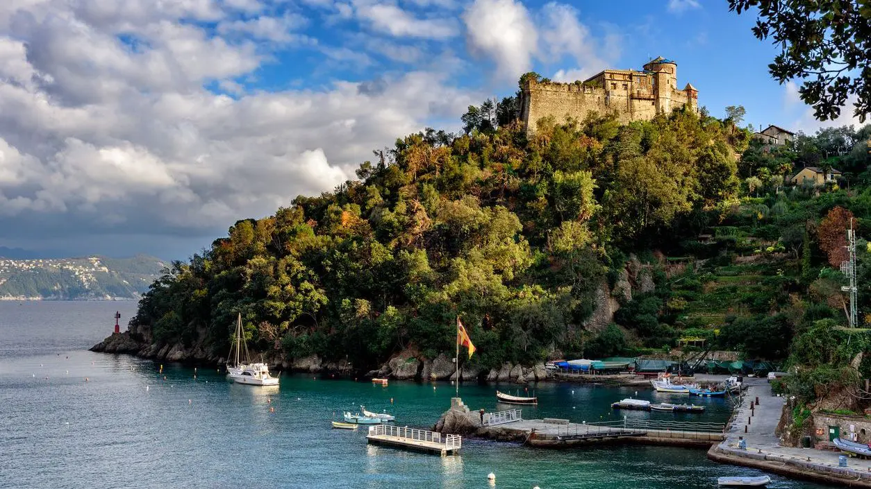 An old medieval castle on a hill near the harbor of Portofino.