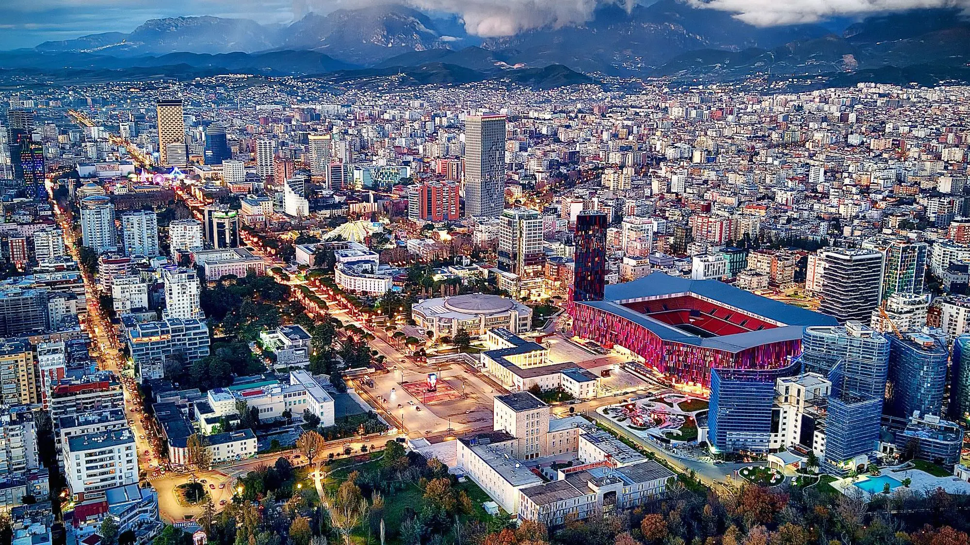 An aerial photo of Mother Teresa Square in Tirana with the vast concrete city in the background. 