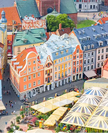 Top aerial view of the old town with beautiful colorful buildings in Riga, Latvia. Summer sunny day. European tourism concept