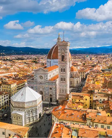 Aerial cityscape view on the dome of Santa Maria del Fiore church and old town in Florence.
