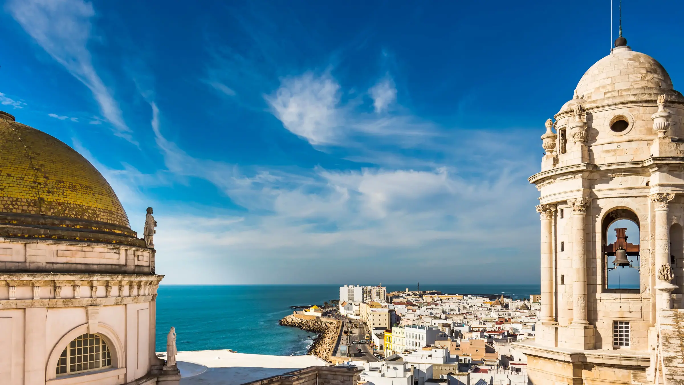 View of the sea and the town from the Cathedral in Cadiz, one of the best places to visit in Andalusia. 