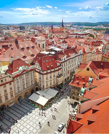 Aerial view of Prague roofs of historical buildings from the Old Town Hall