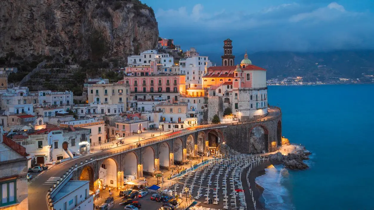 Twilight over the seaside village of Atrani, one of the must-see places on the Amalfi Coast. 