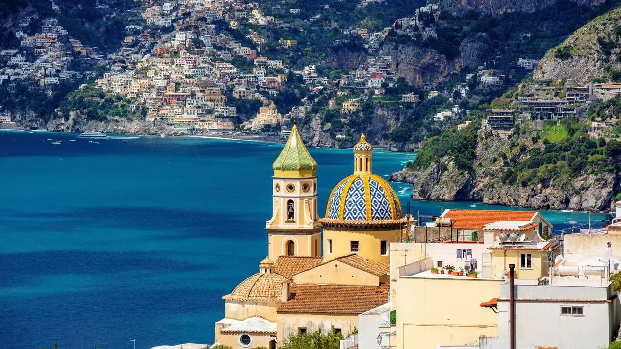 A beautiful church in Praiano with Positano in the background. 