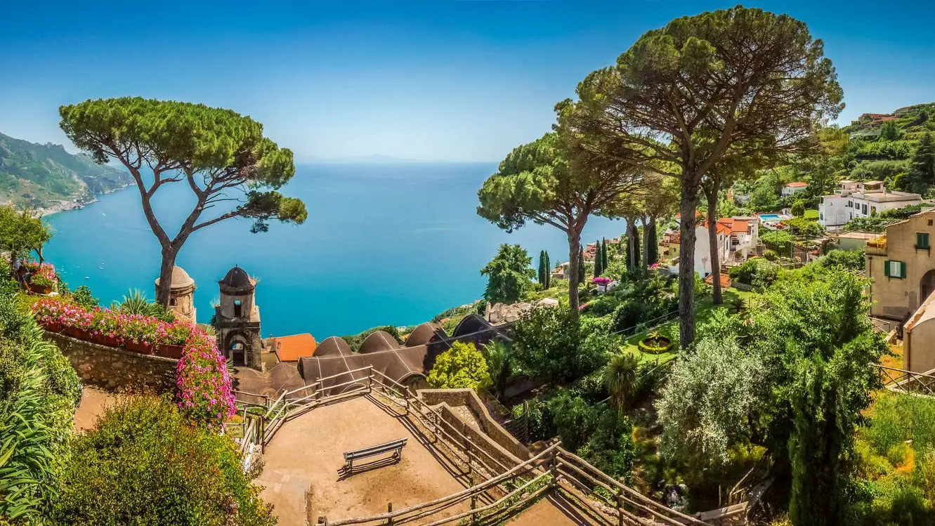 The scenic, picture-perfect view of the famous Amalfi Coast from the Villa Rufolo gardens in Ravello, Campania, Italy.