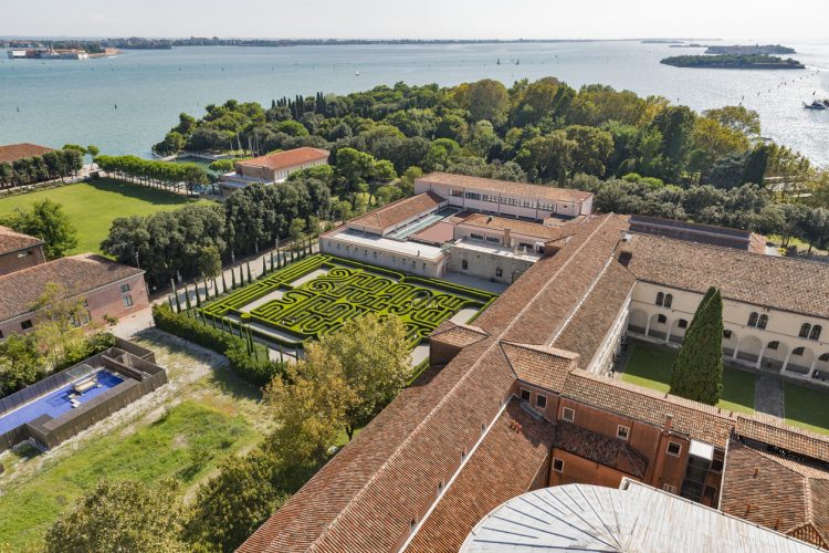 Aerial view over Church of San Giorgio Maggiore, Cultural center Fondazione Giorgio Cini and Labyrinth Borges. Venice, Italy.