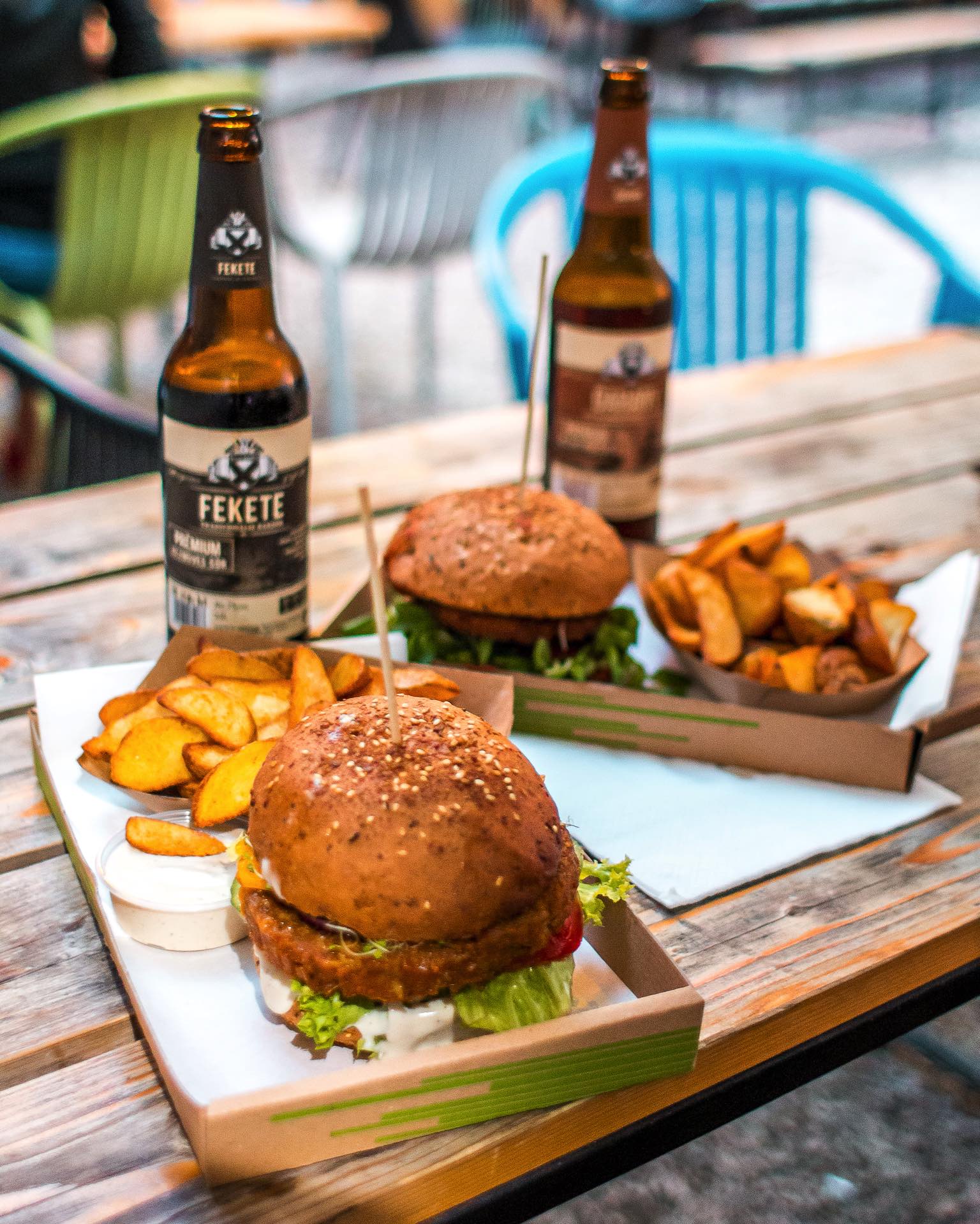 Burgers and potato wedges with beer at Napfenyes.