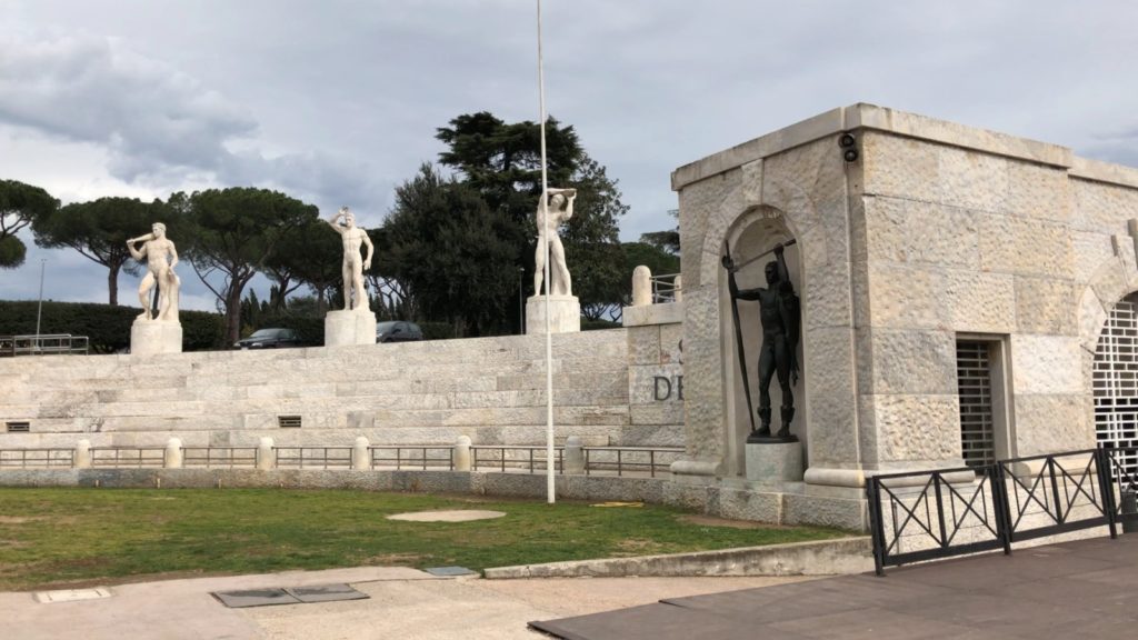 The seating and some statues at the stadio dei marmi