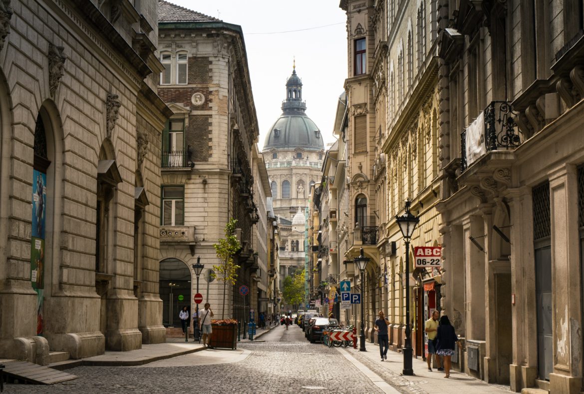 Looking down a narrow street in Budapest towards St Stephen's Basilica