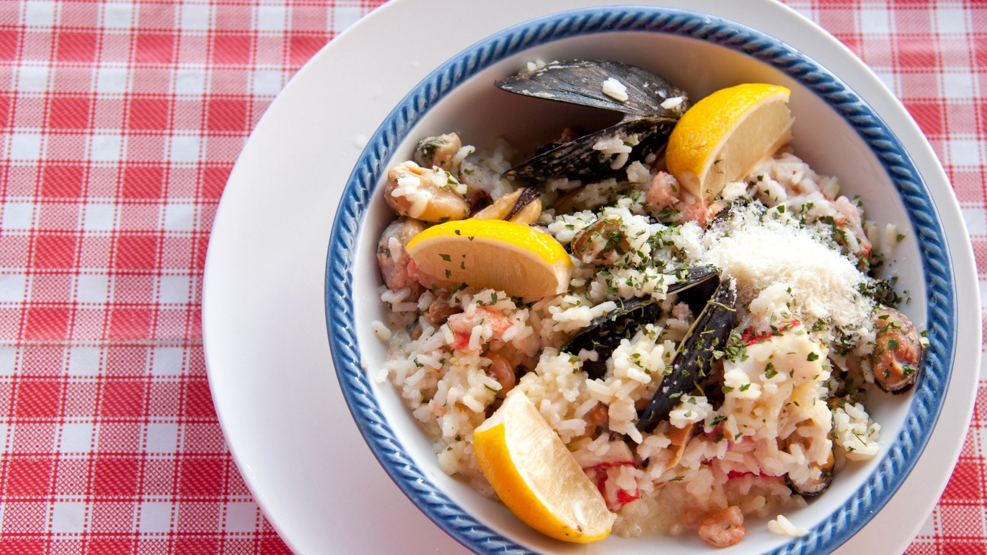 This image is a close-up of a dish of Croatian risotto with seafood. 