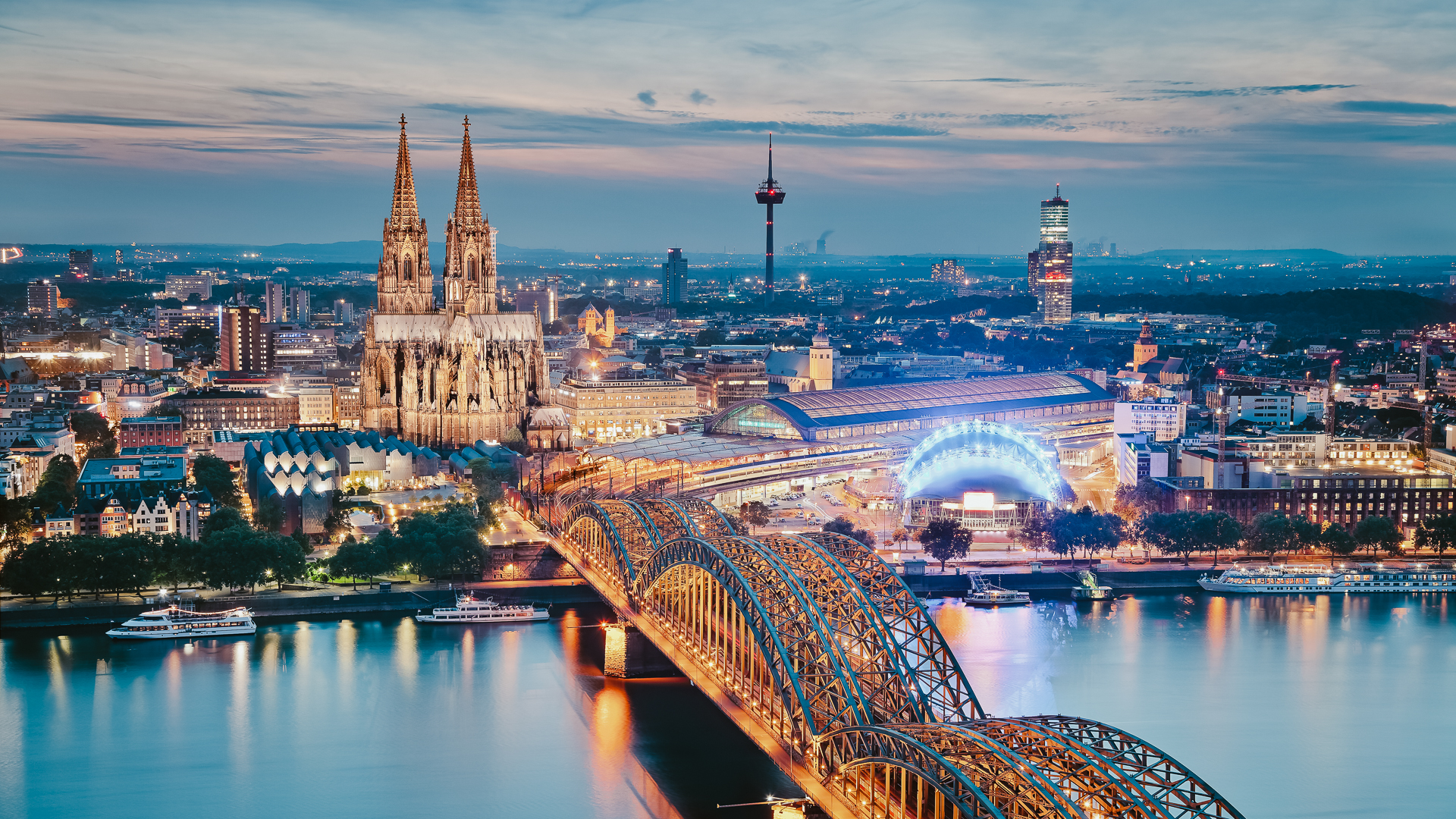 Image of Cologne with Cologne Cathedral during twilight blue hour.