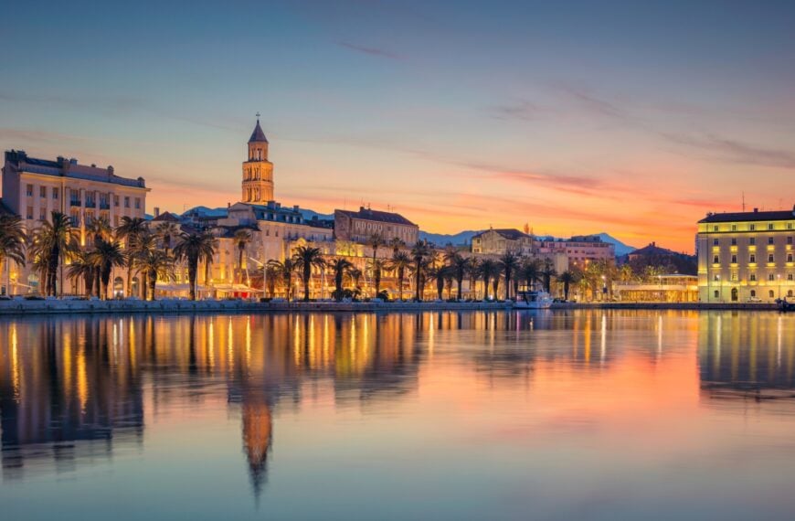 This is a panoramic view of Split under the warm sunrise colors. There's a perfect reflection of the buildings on the calm sea waters. Split should always be part of the best Croatia itineraries.