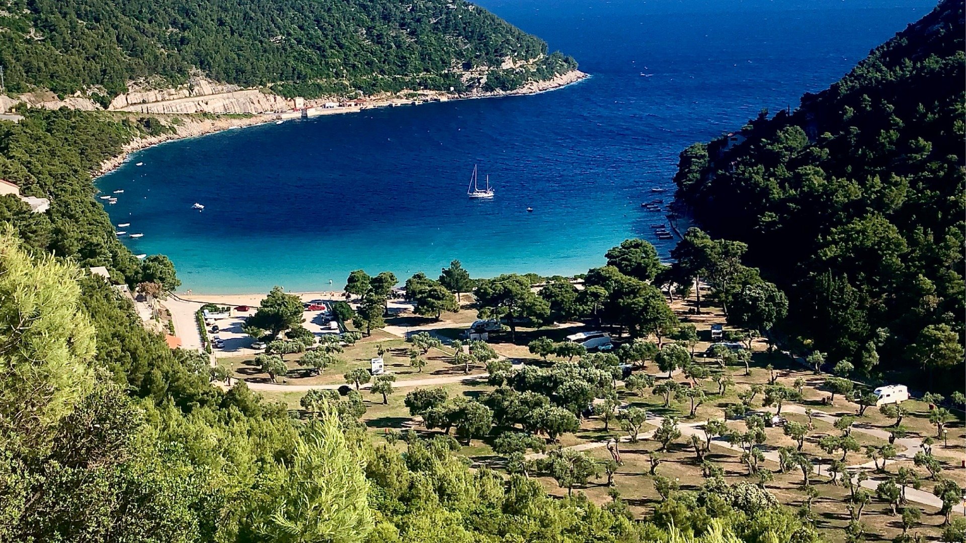 This is a panoramic view of Prapratno Bay, one of the best Croatia beaches. The sea water is turquoise near the beach but becomes deep blue the farther off the shore you go. 