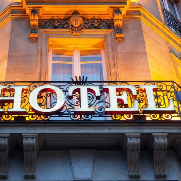 This is a close-up of a big hotel sign on a Parisian building facade.