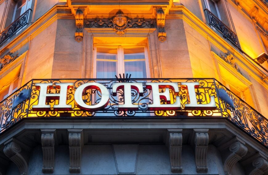 This is a close-up of a big hotel sign on a Parisian building facade.