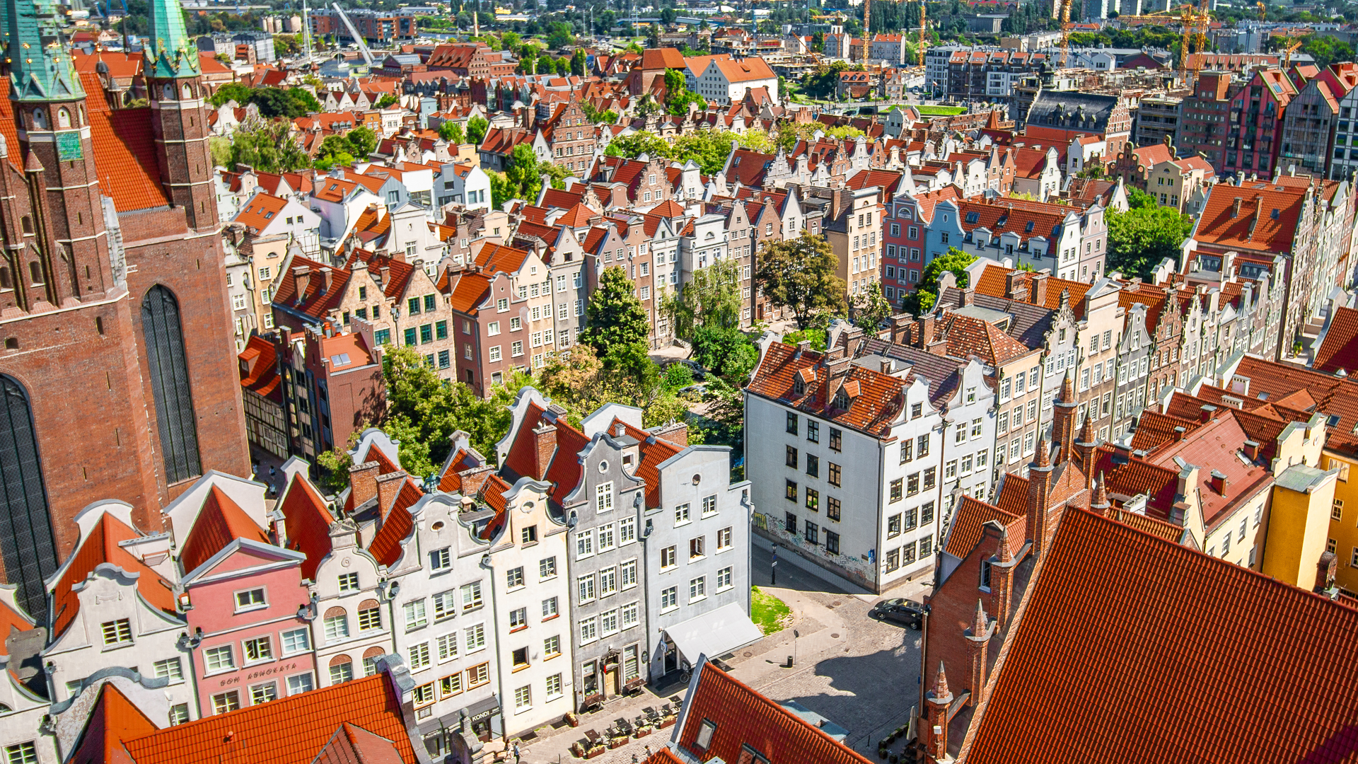 This is a panoramic view of Gdansk with its red-tiled roofs. 