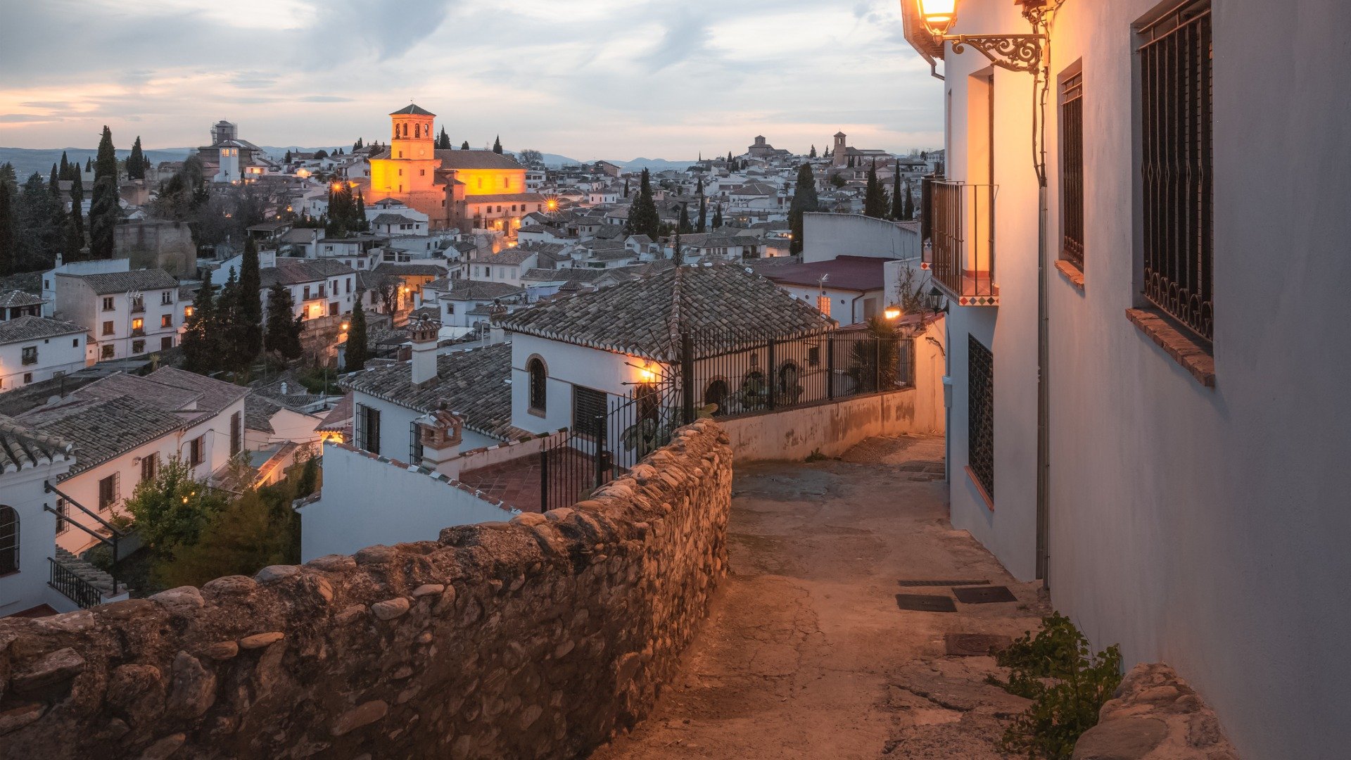 This is a panoramic view of Granada Old Town at dusk. 