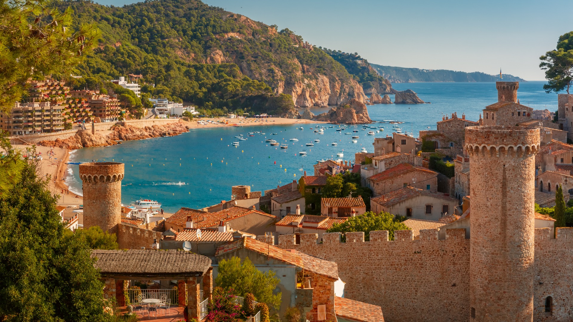 Aerial view of Fortress Vila Vella and Badia de Tossa bay at summer in Tossa de Mar on Costa Brava.