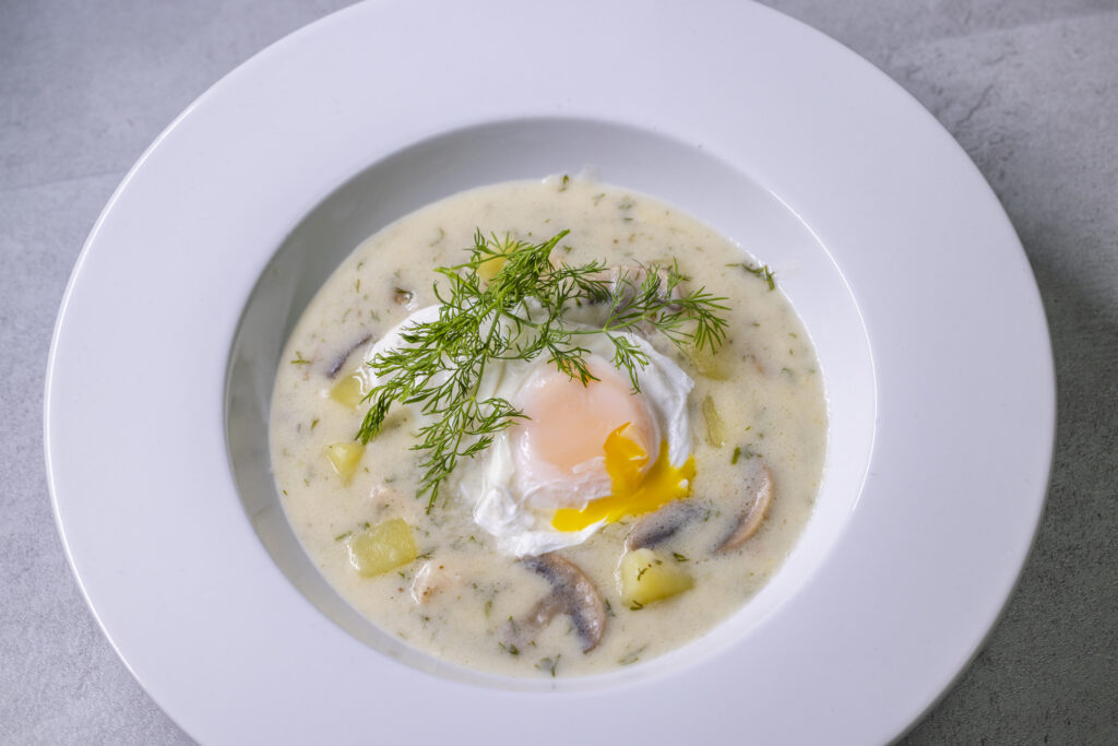 Kulajda (dill soup) with a poached egg.