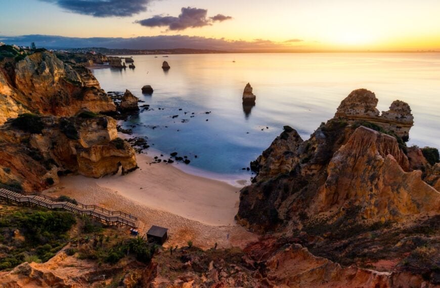 A panoramic view of Praia do Camilo at sunset.