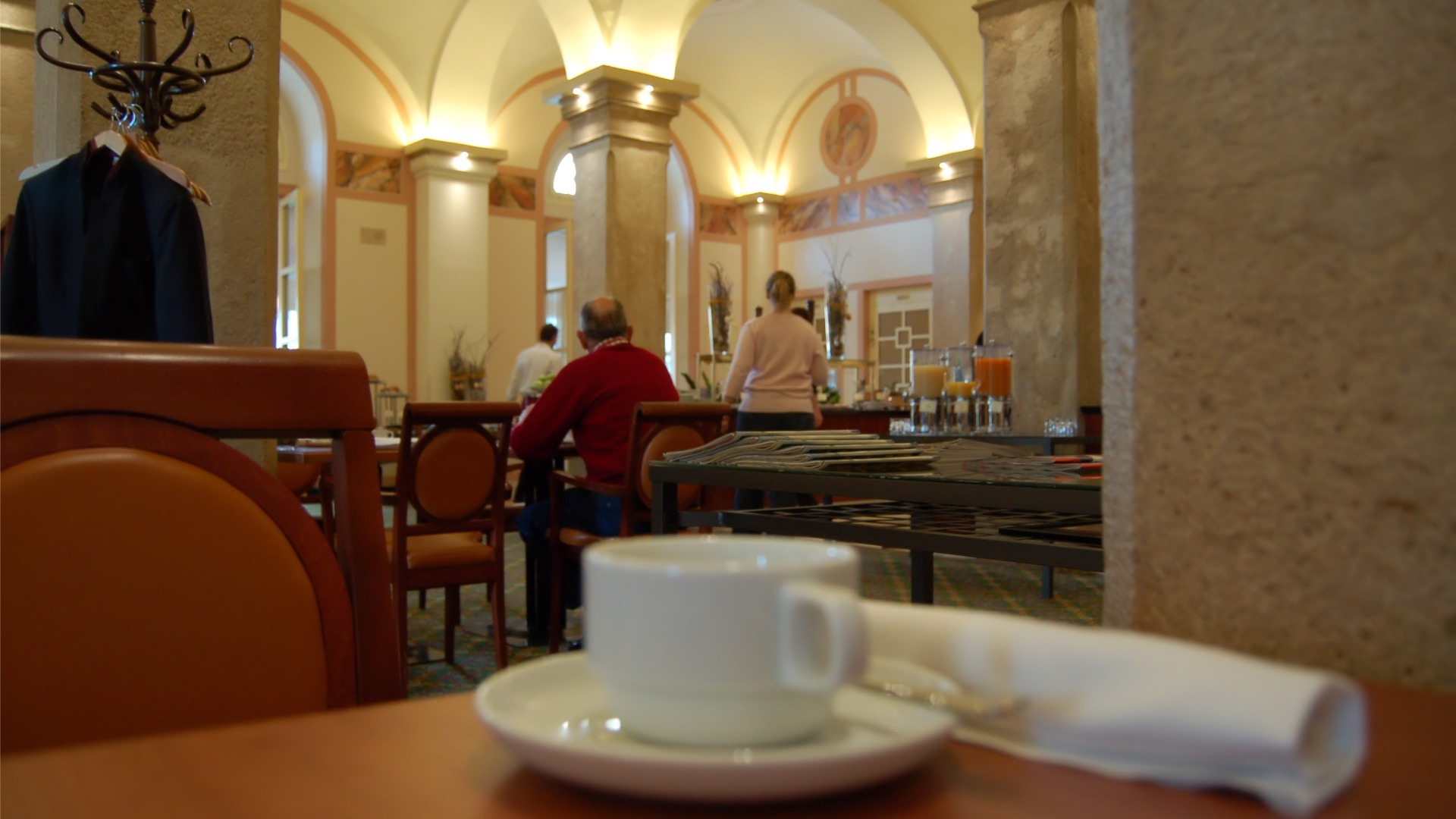 The interior of a Viennese coffee house with classic furniture. 